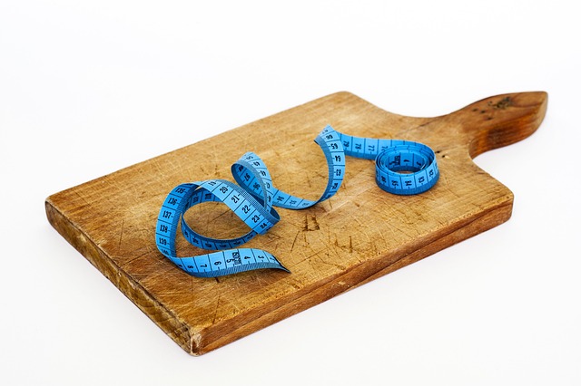 Healthy meal portion with measuring tape — diet