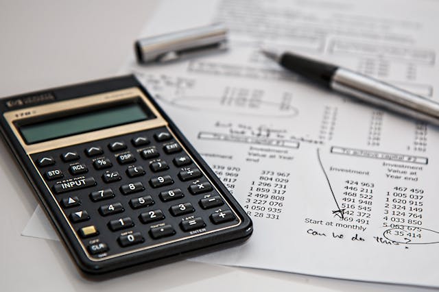Calculator and financial documents — mortgage payment calculation guide