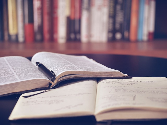 Open book in a library — words and text